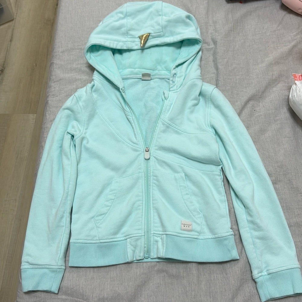 Worn once.  Cubcoats. Nell the Narwhal Zip-Up Hoodie
Size 9